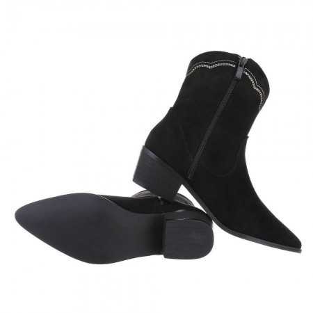 Chaussures femme, bottes style santiags pour un look cowgirl à talon et bout pointu. Motifs brodés et ornements de strass.