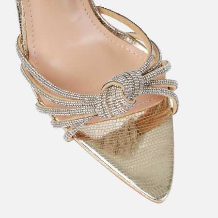 Sublimes chaussures ultra glamour escarpins mules transparentes avec nœud sertie de strass.Hauteur du talon : 11 cm